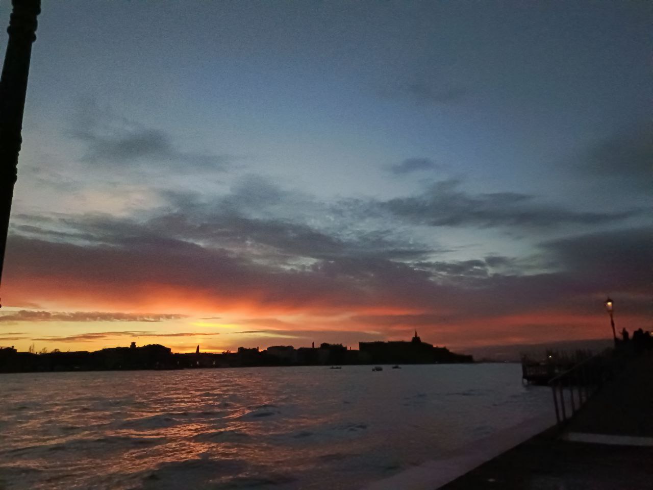 The photo shows Venice at sunset The photo shows Venice at sunset